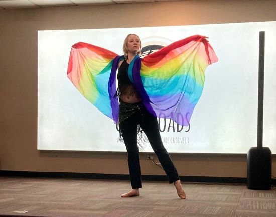 dancer with rainbow scarf